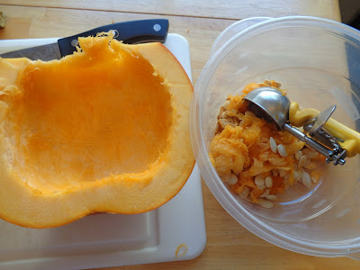 A metal ice cream scoop is the best tool for cleaning out pumpkins and other types of big squash.