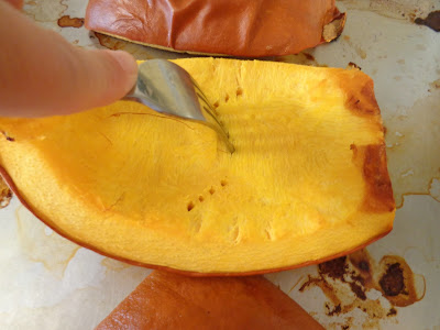 After about 50 minutes of cook time the pie pumpkin is fork tender, but must cool for about 30 minutes before it's processed. 