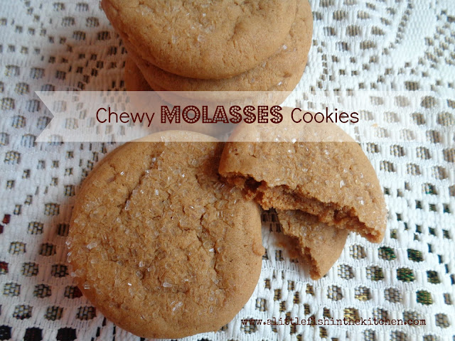 Golden brown molasses cookies are served on a platter with a vintage cotton doily. The cookies look soft and tempting with crackled, sugar coated tops.