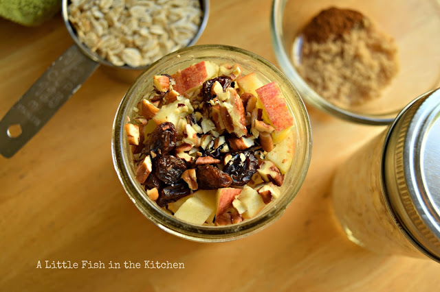 The delicious, hearty crunch topping for these apple-cinnamon overnight oats: chopped apple, raisins, and earthy chopped pecans. The rustic, hearthy topping are very inviting.