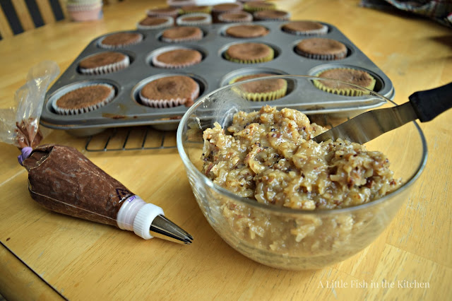 Delicious, homemade coconut pecan icing is ready to use. Chocolate icing is also ready to use in a piping bag with a no. 21 star tip.