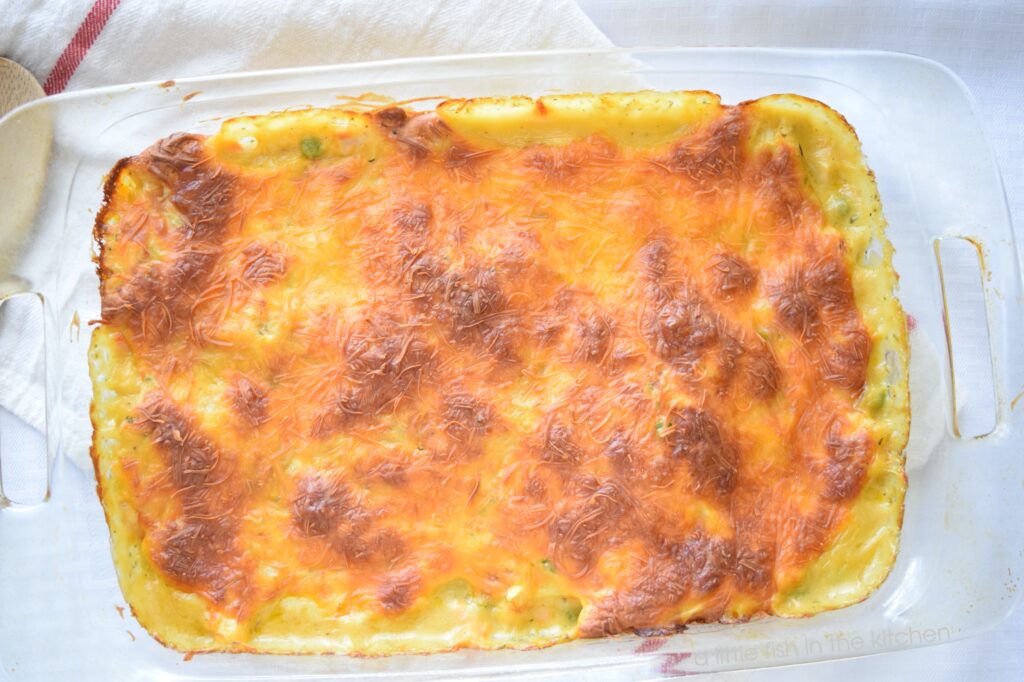  Picture of the golden brown top of a chicken pot pie bubble up casserole.