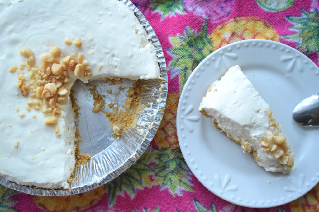 picture of a slice of creamy pineapple pie on a plate