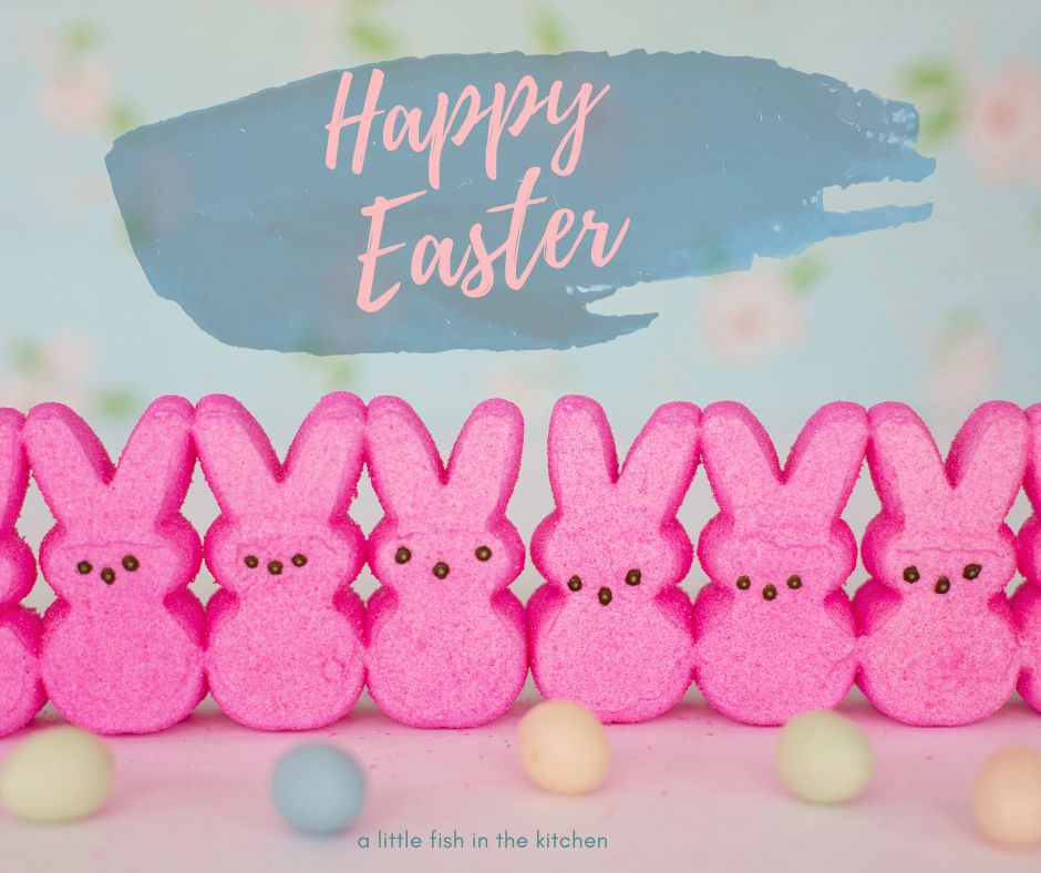 Happy Easter graphic with pastel colors, pink Peeps bunnies and small candy eggs. The words "Happy Easter" in in cursive at the top of the picture.